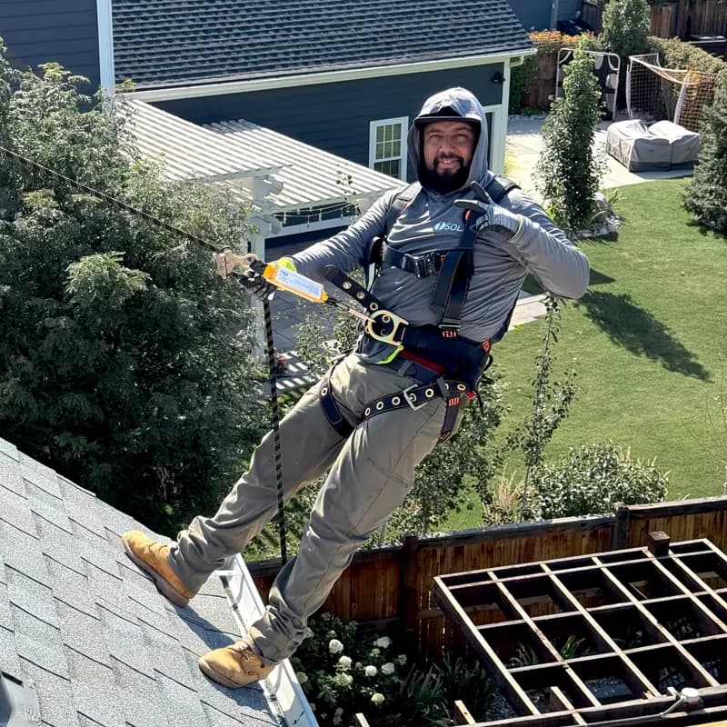 Roofing crew member on site